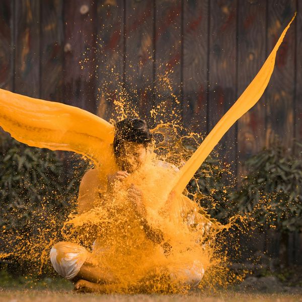 Person looking vibrant and full of energy in a natural setting.